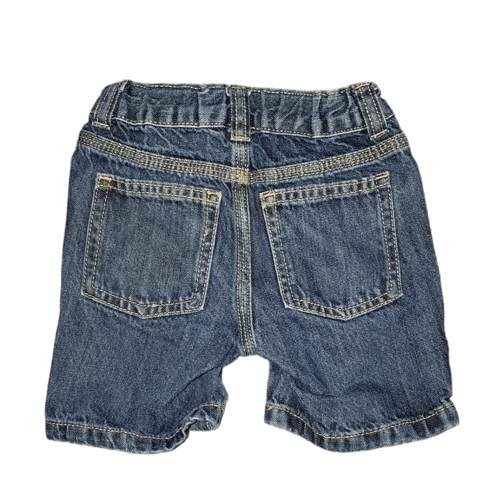 The children’s place size 2T denim shorts button snap light wash